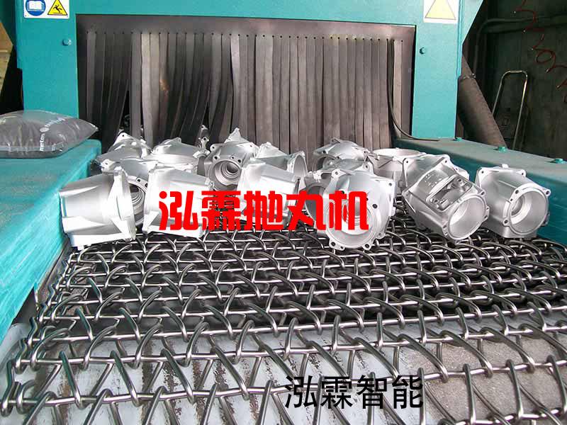 網帶(dai)式抛丸清(qing)理(li)機