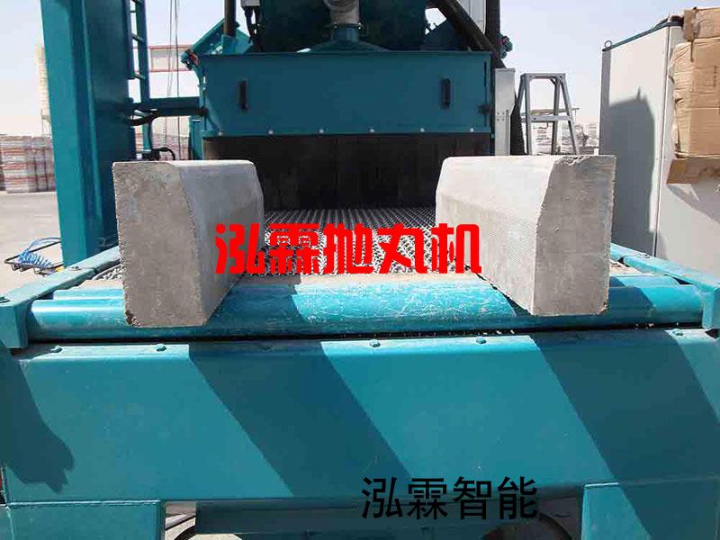 網帶(dai)式(shi)抛丸機(ji)