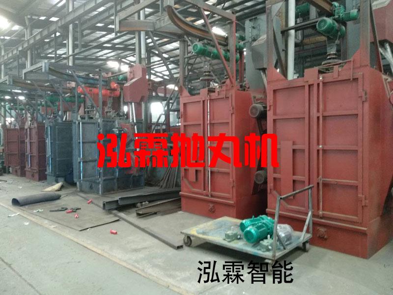 弔(diao)鉤(gou)式(shi)抛(pao)丸機(ji)現(xian)貨(huo)車間(jian)