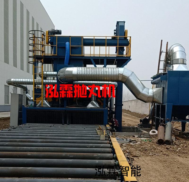 鋼(gang)闆抛(pao)丸除鏽機(ji)對鋼闆(ban)進行錶(biao)麵(mian)處(chu)理(li) 鋼(gang)闆抛丸(wan)除鏽(xiu)機(ji)對鋼(gang)闆(ban)進行錶麵(mian)處(chu)理